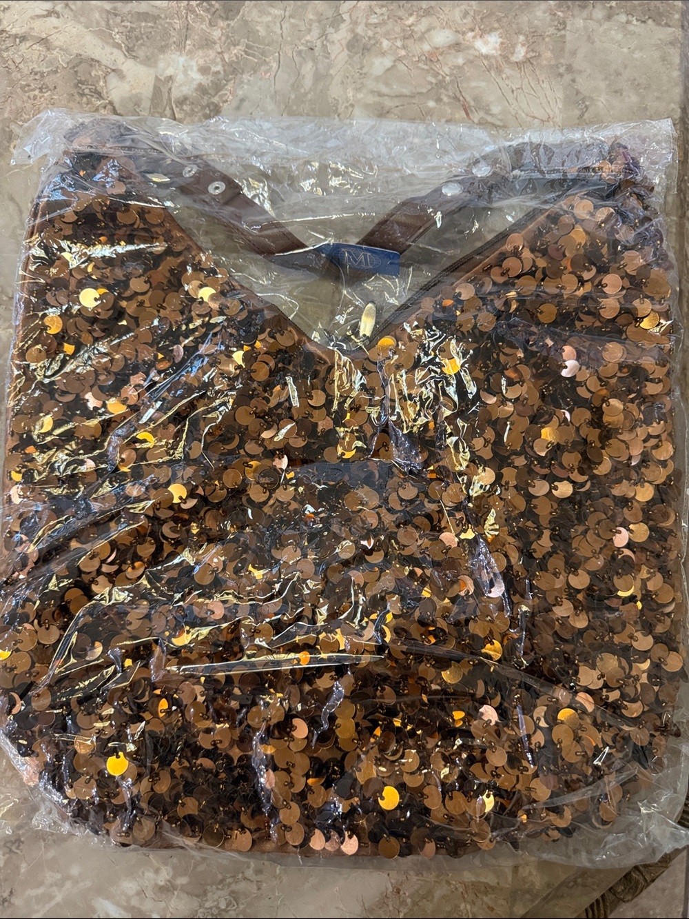 Copper Bronze Sequin hand bag- Never been worn.  Tags attached.